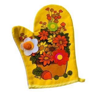 Very vintage 1970s bright yellow and floral print with felt posies oven mitt